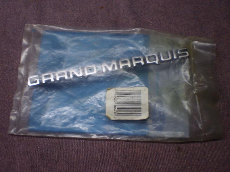 Mercury 88,91 grand marquis roof name plate orig. ford nos