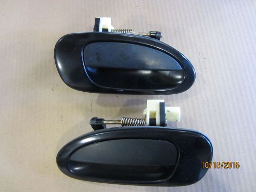 2 rear handle, outside black, right and left mazda protege 1996-1997-1998