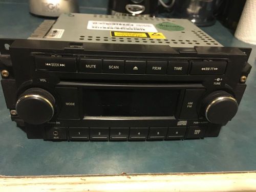 2006 jeep commander radio part# p05064171af