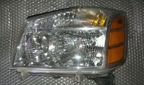 06,07,08 nissan titan driver side headlight oem only 32k miles 