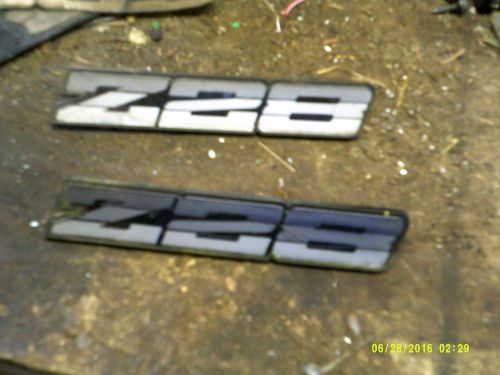 82-87 camaro z28  rocker emblem set 88 89 91 90 92 oem nice silver emblems