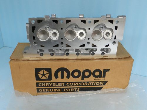 Umc aeromate van / mopar cylinder head  w/ valves 3.3l&amp;3.8l v6 eng oem usa