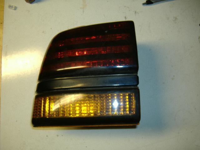 Rear lh drivers side tail light brake light turn signal 91 92 93 pontiac sunbird