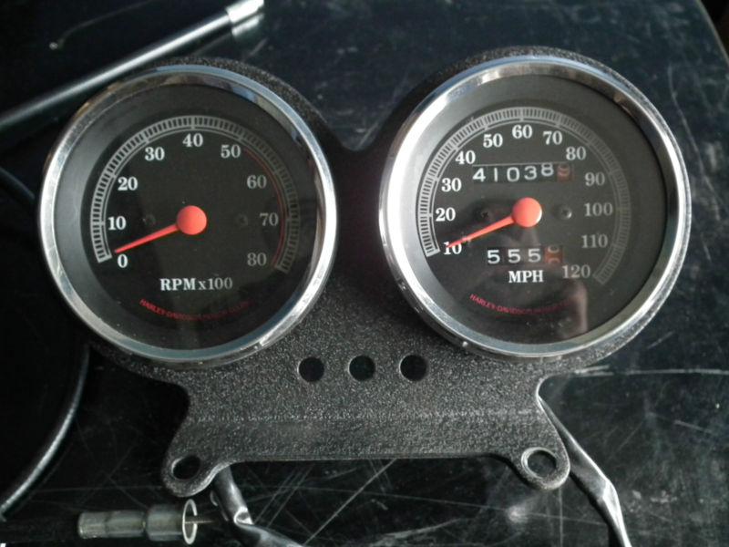 Harley tachometer and speedometer with speedo cable housings and mount