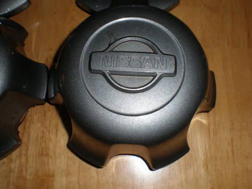 2001-2004 nissan frontier charcoal oem center cap -1 **40315- 9z 410** 