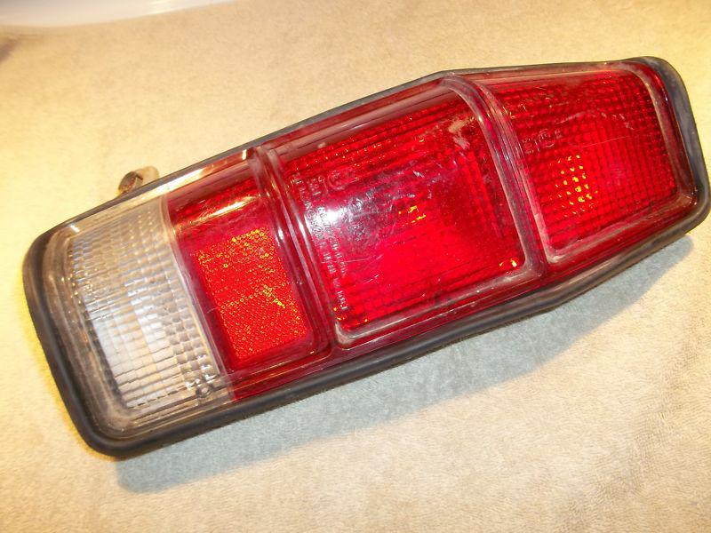 Good used 1979-1984 mazda b tail light assembly, imprinted koito 220-41296 l 584