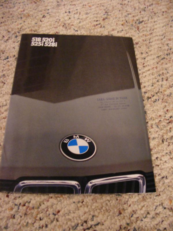 1983 bmw 5-series brochure/poster.  16pages, folds out to full poster, french 