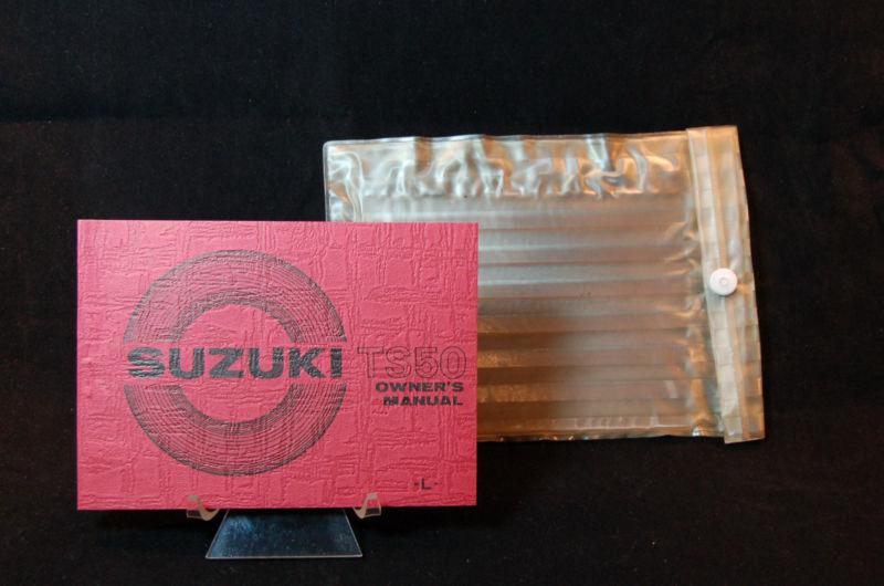 1974 ts50-l suzuki owners manual-mint w/original holder