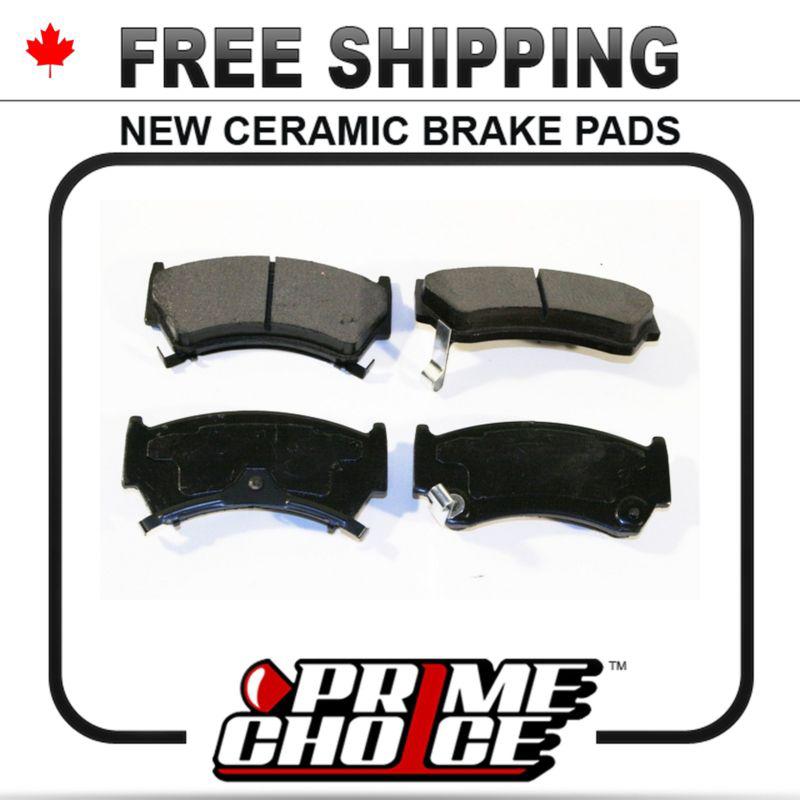 New premium complete set of front ceramic disc brake pads with shims