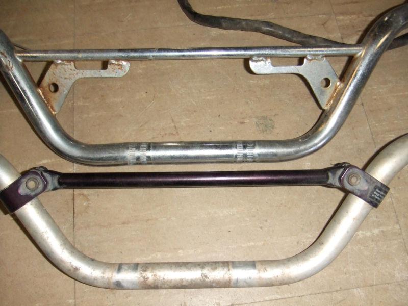 Two older dirtbike handlebars-honda, yamaha, suzuki-used- 7/8 inch dia.straight 