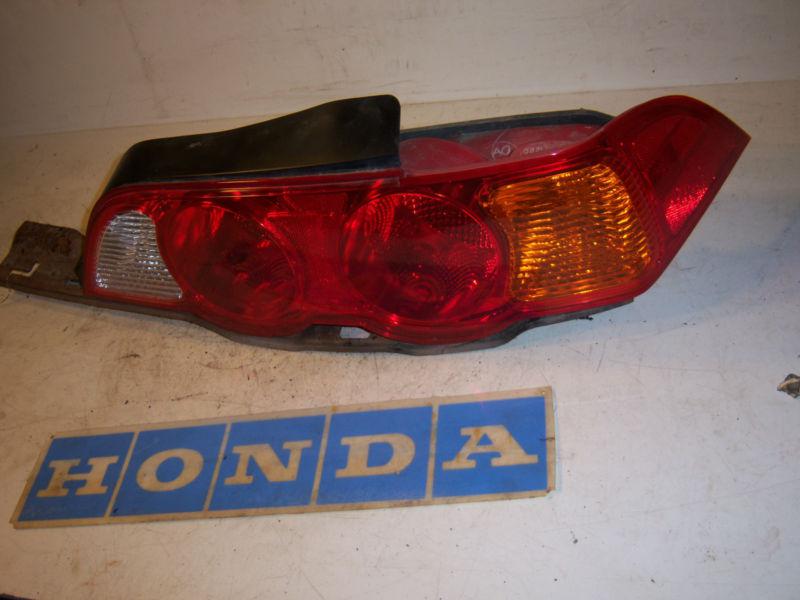 2002  acura rsx passenger right taillight brake light lamp tail lens bracket