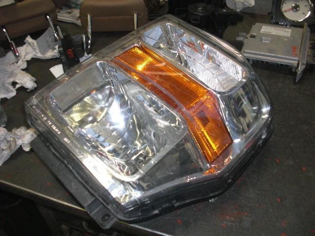 08 09 10 ford f250 super duty l. headlight 542910