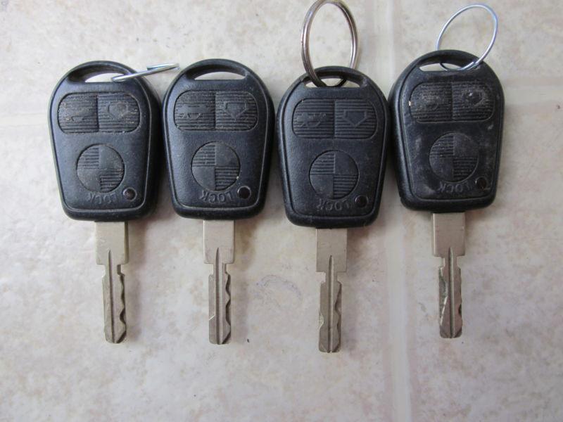 Lot of 4 oem bmw 1 3 5 6 7 series key keyless remote lx8 fzv