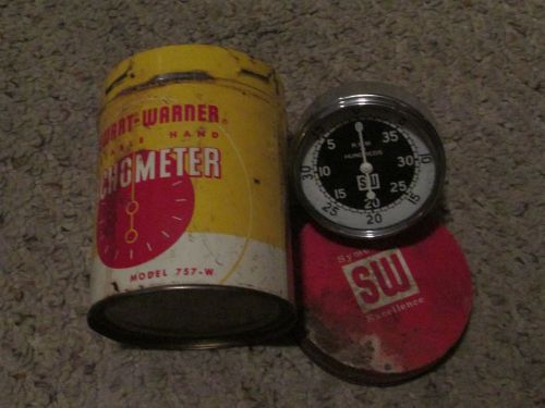 Vintage stewart -warner tachometer model 757w in original can