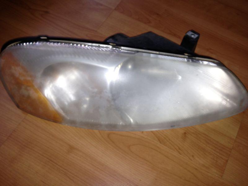 2002 chrysler sebring convertible passenger side head light