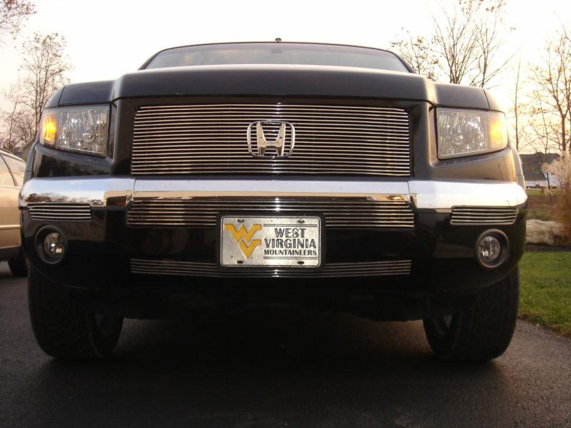 Honda ridgeline aftermarket chrome grille  no emblem.  used