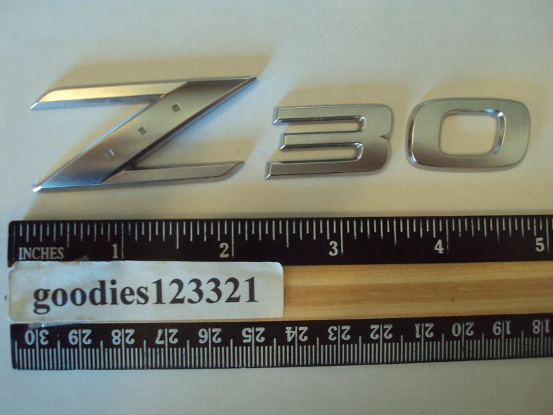 Nissan z30 chrome emblem 