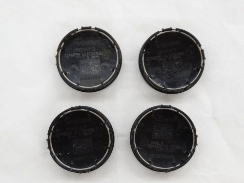 Genuine oem volvo wheel center caps part # 30666913 set of 4