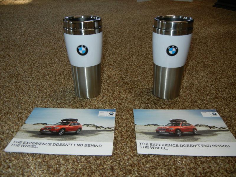 Two genuine bmw logo steel tumbler coffee mugs plus two, $10 bmw gift cards