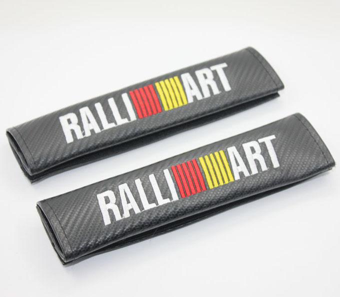 A pair ralliart carbon fiber seat belt cover shoulder pad pads for mitsubishi