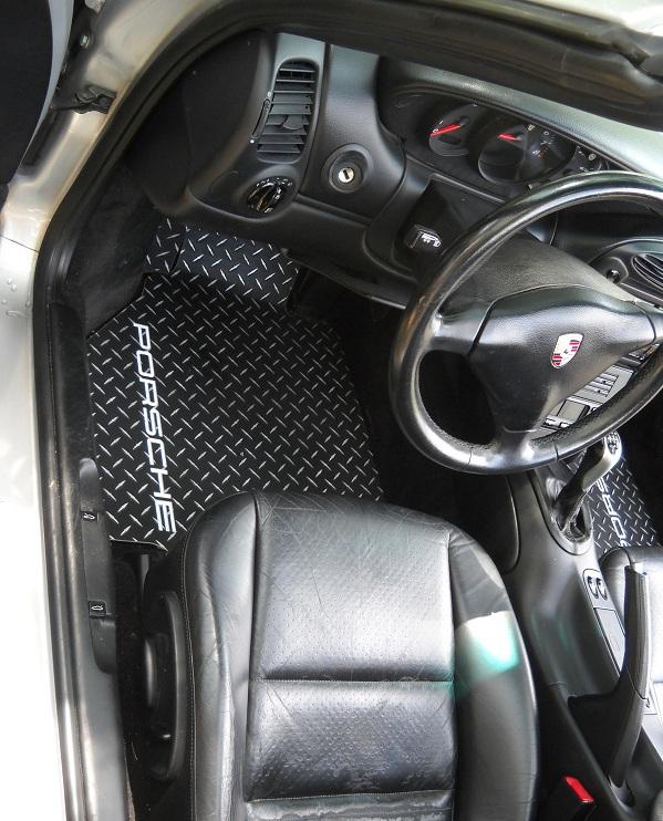 Porsche   black aluminum  floor mats with exposed metal diamonds  custom shaped