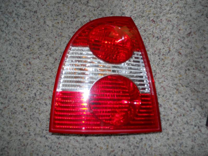 2002 vw passat tail light drivers side