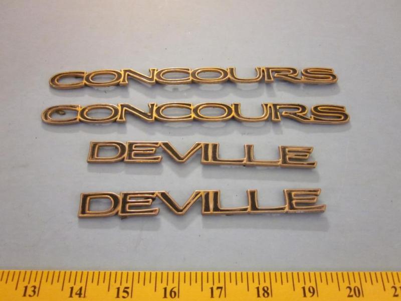 Cadillac concours deville factory gold quarter panel emblems