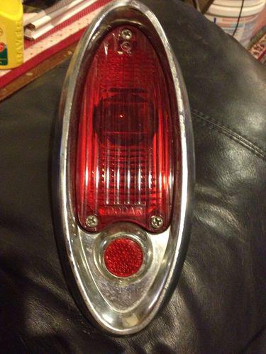 1953 nos dodge taillight assembly part# 1527220