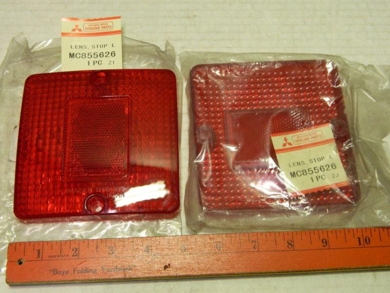 Pair mitsubishi lens red unknown car or truck model: lens stop l mc855626
