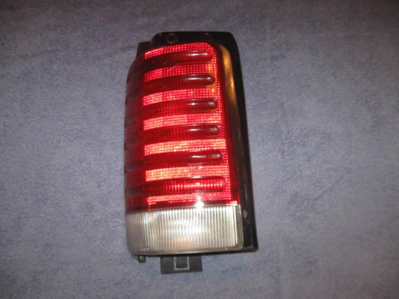 Dodge caravan tail light driver left side 91-95