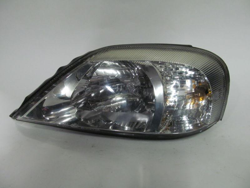 00 01 02 03 04 05 mercury sable oem left headlight nice!   