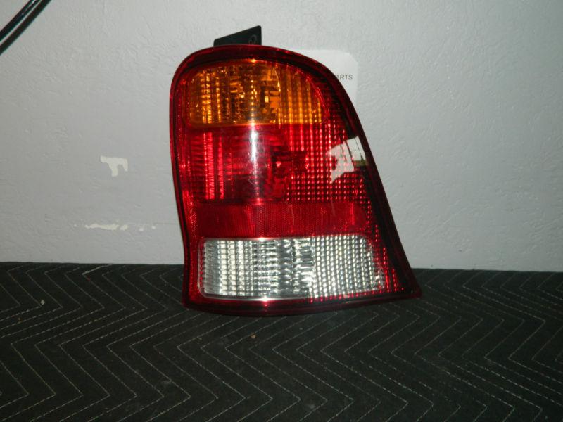 Oem 1999-2003 ford windstar right/passenger side tail light assembly 