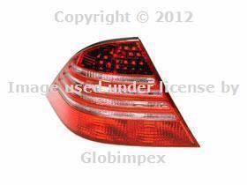 Mercedes w220 (03-06) left taillight lens w/ housing oem new + 1 year warranty