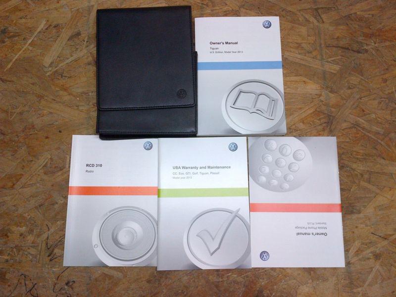 12 vw volkswagon tiguan owners manual / handbook / guide  package