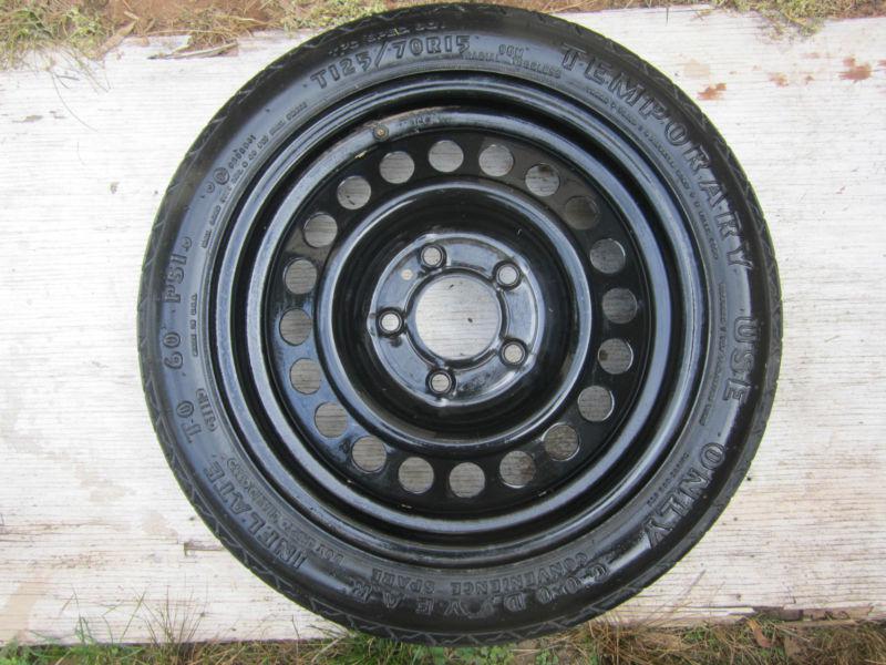 Spare tire  new   125 70 r15