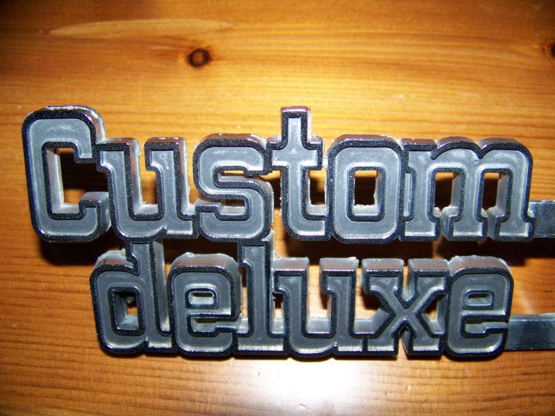 Custom deluxe 10 emblem gm casting number 14016633 (cast into metal on the back)