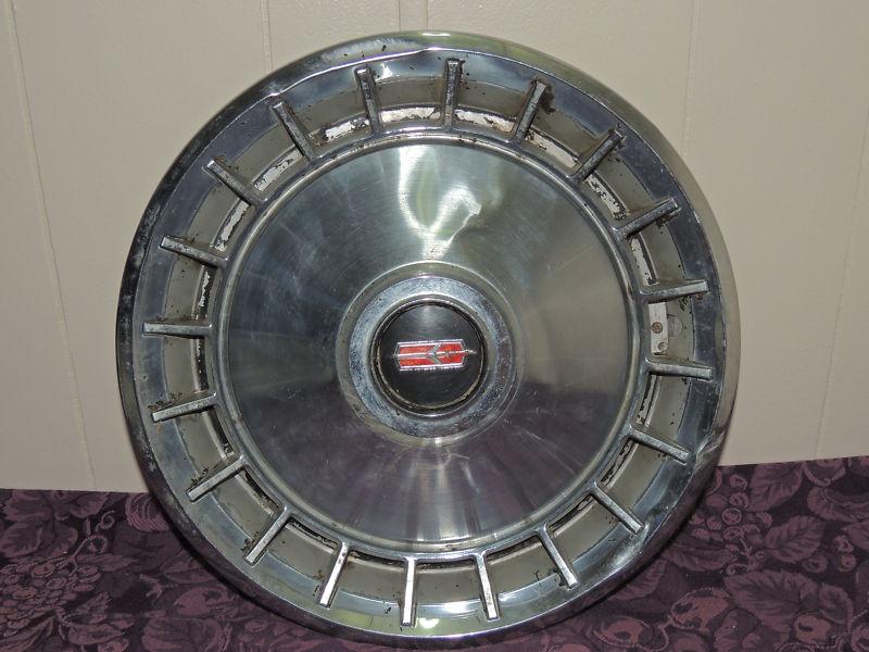 Antique oldsmobile hubcap