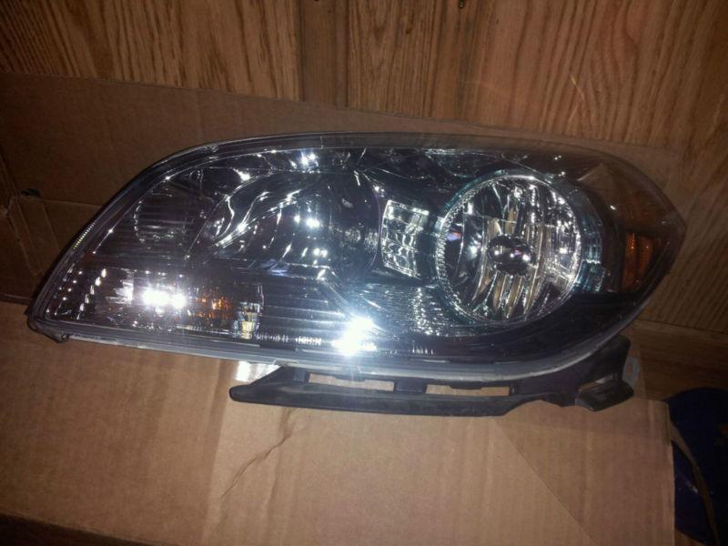 2012 chevy malibu lh headlamp