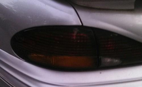 Pontiac bonneville tail light assembly 96 97 98 99 driver side