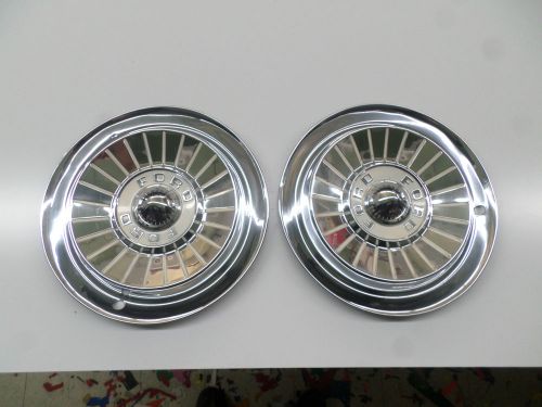 Two 1957 ford 14&#034; wheel covers hubcaps nice driver quality