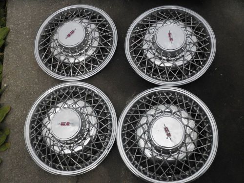 1979-80-81-82-83-84-85 oldsmobile toronado wire hubcaps (4)