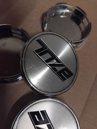 New unused azul alloy wheel centre caps x 4 - approx 56mm diameter