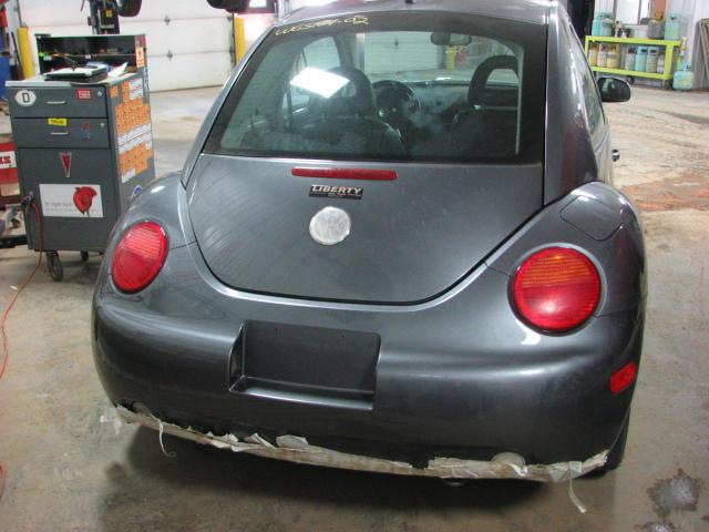 2002 volkswagen beetlefront door left