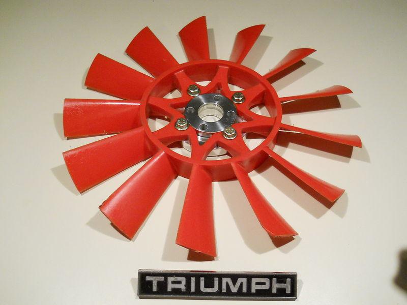 Tr6 perfect red engine fan with lightweight billet adaptor polished nice stuff.