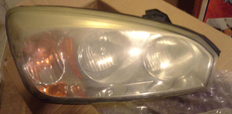 '04-'07 chevy malibu headlight assembly / passenger side / pn 21998708