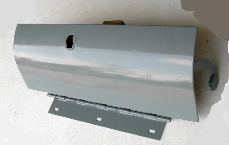 1957  chevy glove box door, hinge, and arm  assembly - item #3