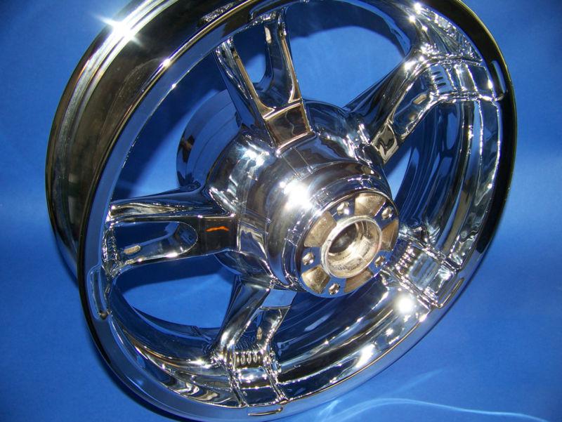 Harley 2014 chrome street glide rear wheel exchange- trade yours for this one