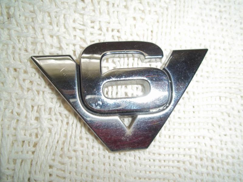 2001 ford escape   "v6"  logo emblem from rear hatch 