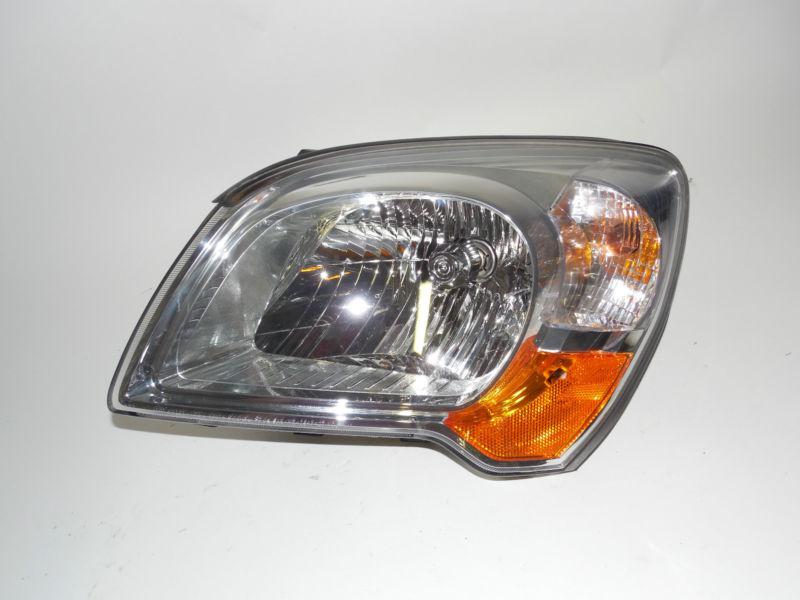 08 09 2010 kia sportage oem left headlight nice!