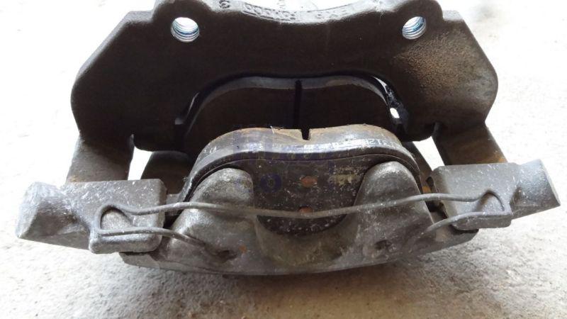 Volvo s40 v50 front right brake caliper assembly w bracket passenger side oem